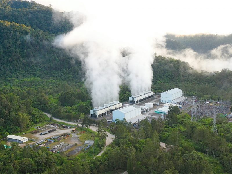 Aerial view of geothermal power production plant. Geothermal power station near to the active volcano Apo. Mindanao, Philippines